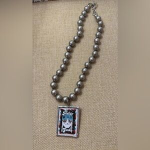 New chunky Willie Nelson necklace.  20 inches in length.